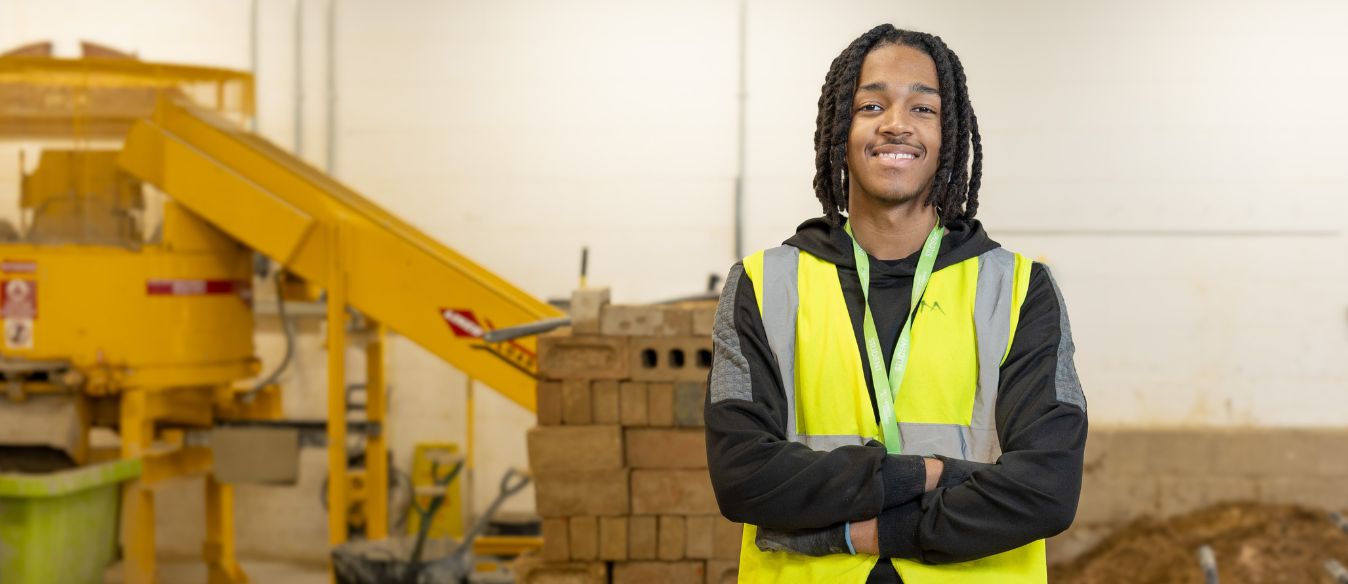 Students laying bricks